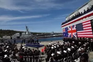 Australia Navigates US Tensions: Tariff Relief Push and AUKUS Defense